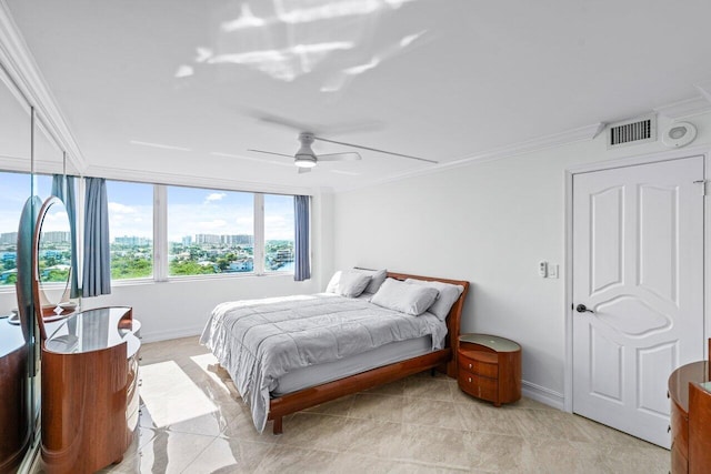 bedroom featuring ceiling fan, ornamental molding, and light tile patterned flooring