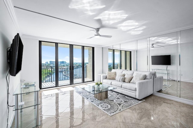 living room with expansive windows, ceiling fan, and ornamental molding