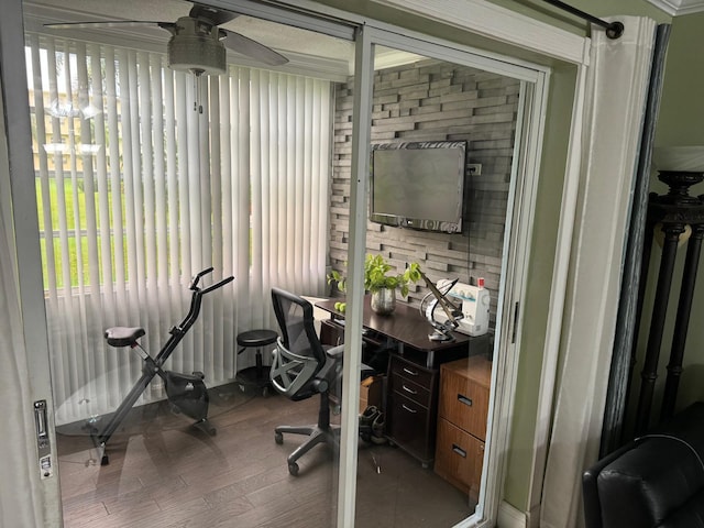 office area with ceiling fan and light hardwood / wood-style floors