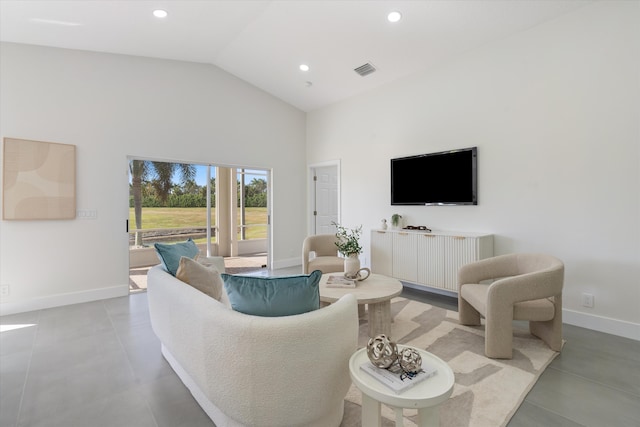 living room with high vaulted ceiling, recessed lighting, visible vents, and baseboards