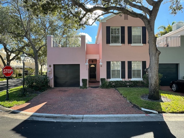 view of front of home with a garage