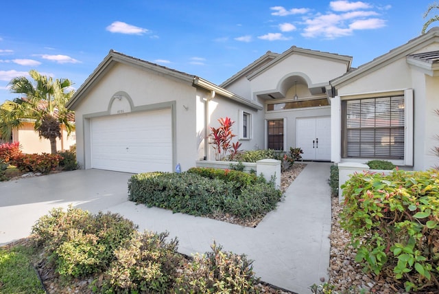 ranch-style house featuring a garage