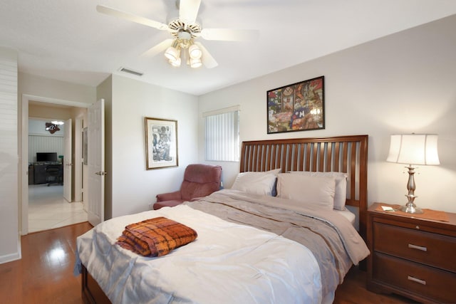 bedroom featuring ceiling fan and wood-type flooring