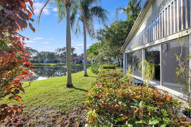 view of yard with a water view