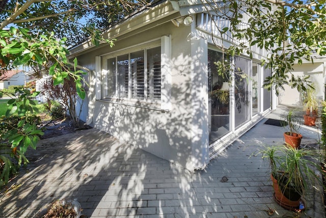 view of home's exterior featuring a deck