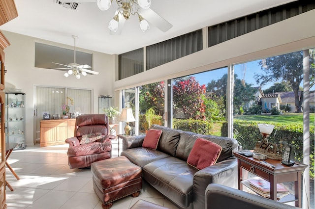 sunroom featuring ceiling fan