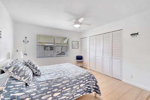 bedroom featuring ceiling fan and light hardwood / wood-style flooring