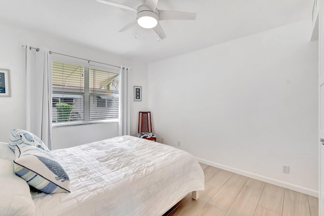 bedroom featuring ceiling fan and light wood-type flooring