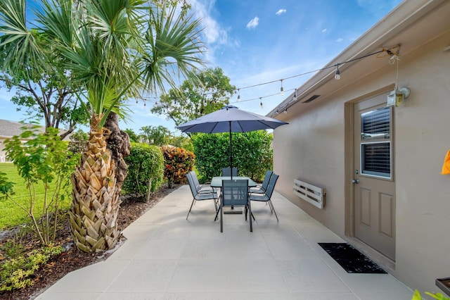 view of patio / terrace featuring heating unit