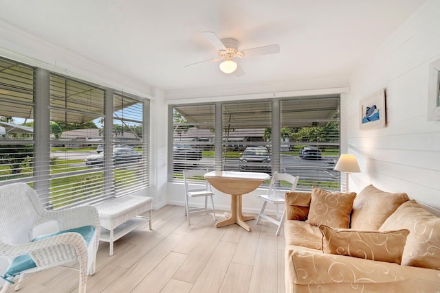 sunroom / solarium with ceiling fan