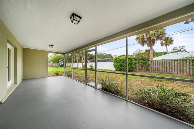 unfurnished sunroom with a healthy amount of sunlight