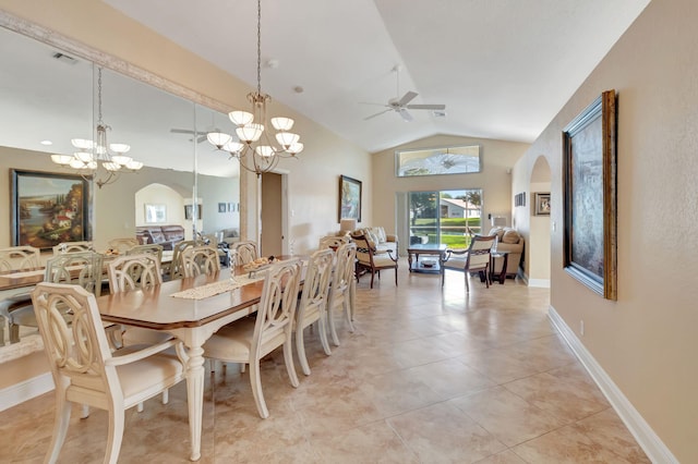 dining room featuring light tile patterned floors, ceiling fan with notable chandelier, and lofted ceiling