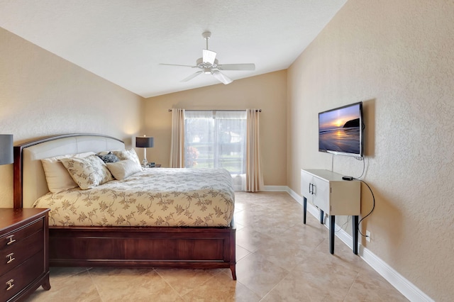 bedroom with ceiling fan and vaulted ceiling