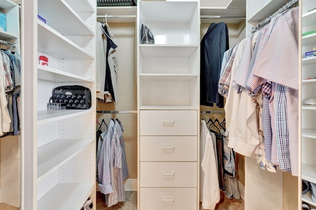 spacious closet with tile patterned flooring