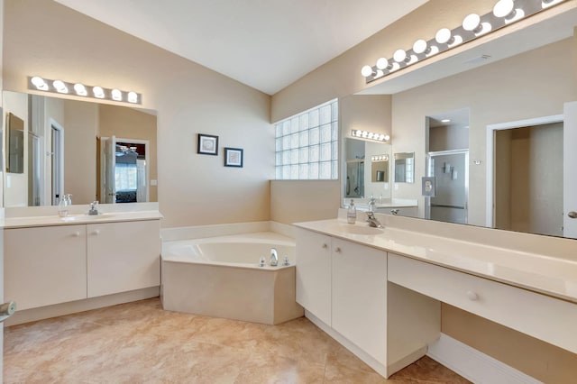 bathroom with plus walk in shower and vanity