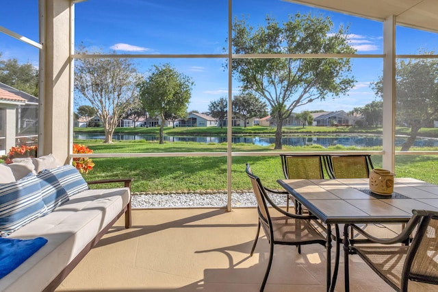 sunroom with a water view