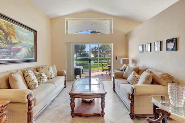 tiled living room featuring lofted ceiling