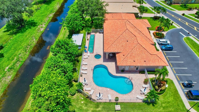 drone / aerial view featuring a water view