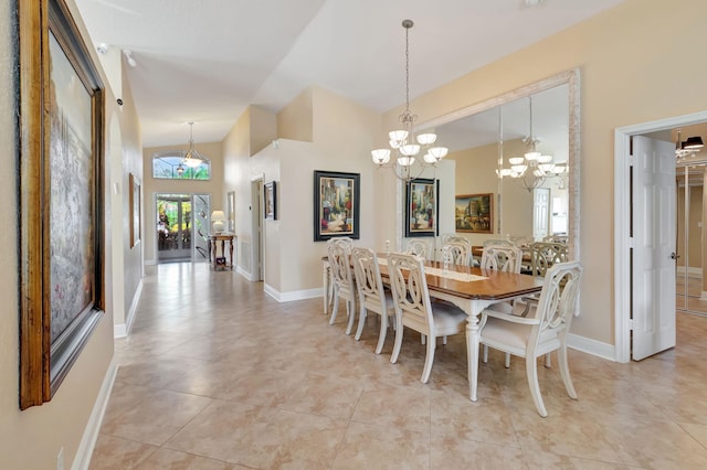 dining area with vaulted ceiling, light tile patterned floors, and an inviting chandelier