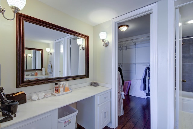 bathroom with vanity and wood-type flooring