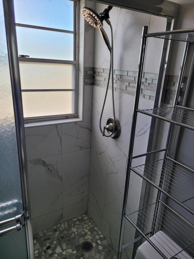 bathroom featuring an enclosed shower