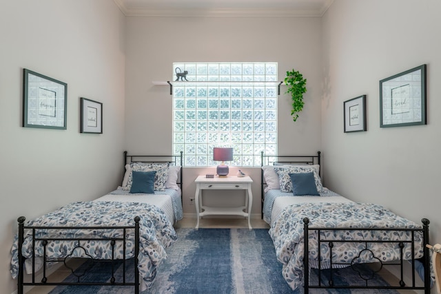 bedroom featuring crown molding