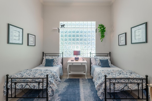 bedroom featuring ornamental molding