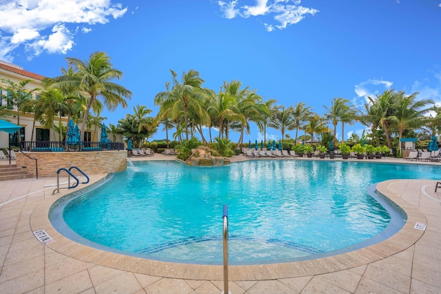 view of swimming pool featuring a patio area