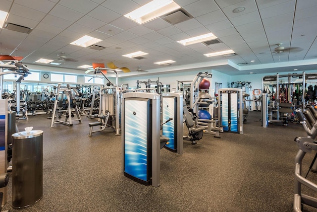 exercise room with a drop ceiling