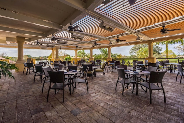 view of patio / terrace featuring ceiling fan