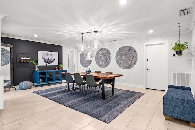 dining area with ornamental molding