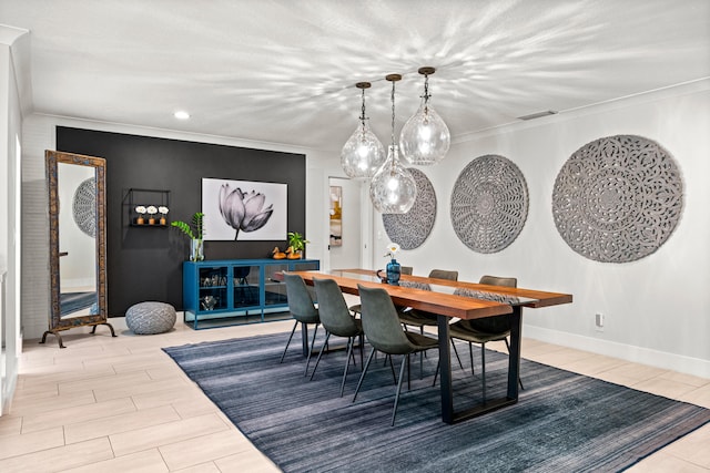 dining space with crown molding