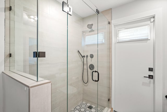 bathroom with an enclosed shower