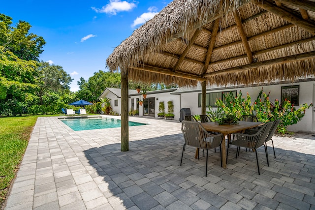 view of pool featuring a gazebo and a patio