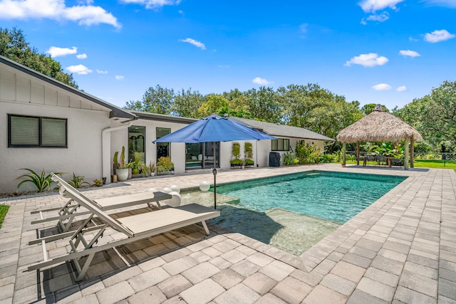 view of pool featuring a gazebo and a patio area