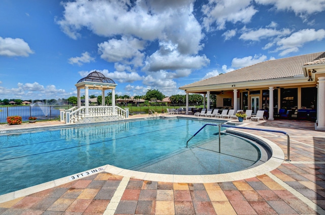 view of swimming pool featuring a gazebo and a patio area