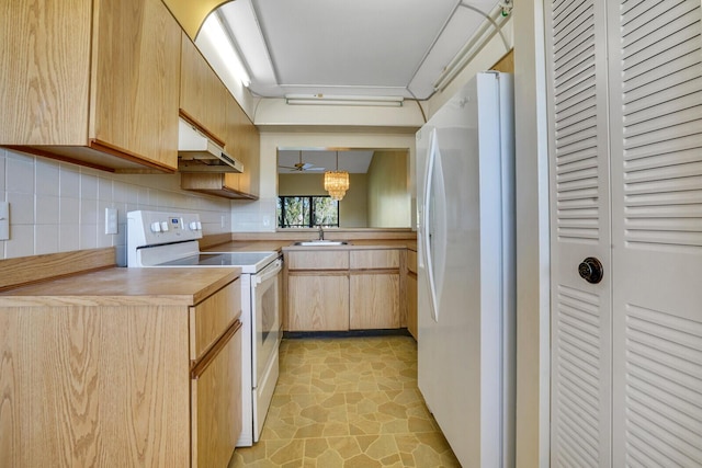 kitchen with sink, white appliances, hanging light fixtures, tasteful backsplash, and light brown cabinets