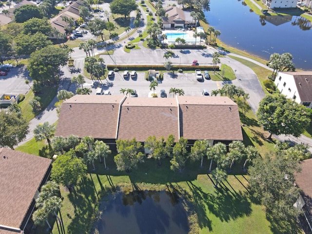 drone / aerial view with a water view