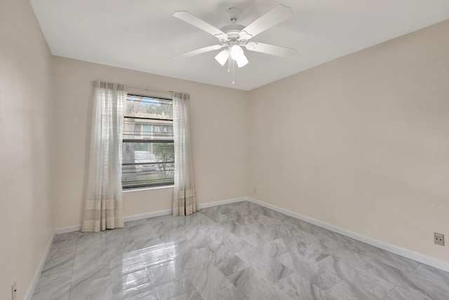 unfurnished room with ceiling fan