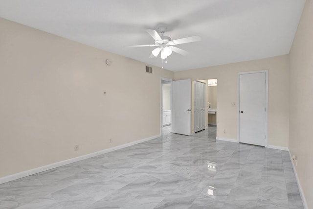 spare room featuring ceiling fan