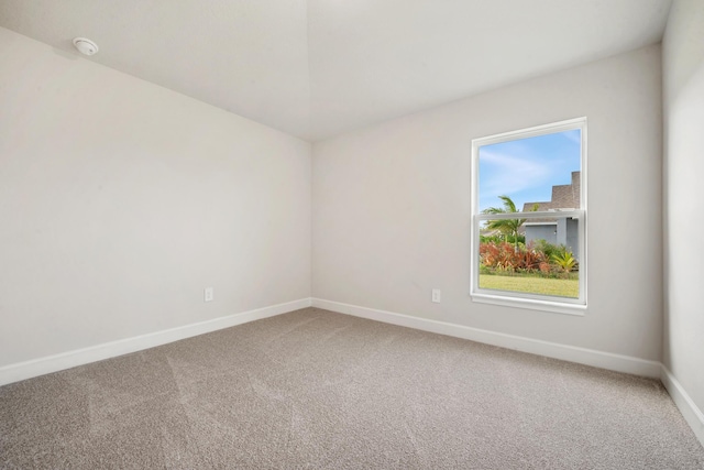 unfurnished room featuring carpet flooring