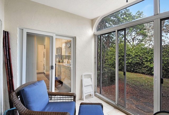 sunroom featuring a healthy amount of sunlight