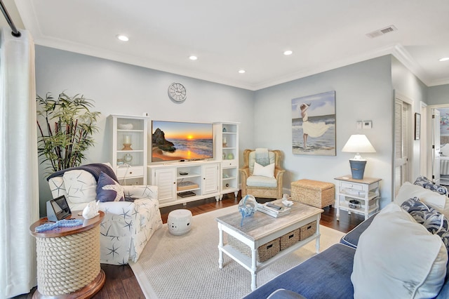 living room with crown molding and wood-type flooring