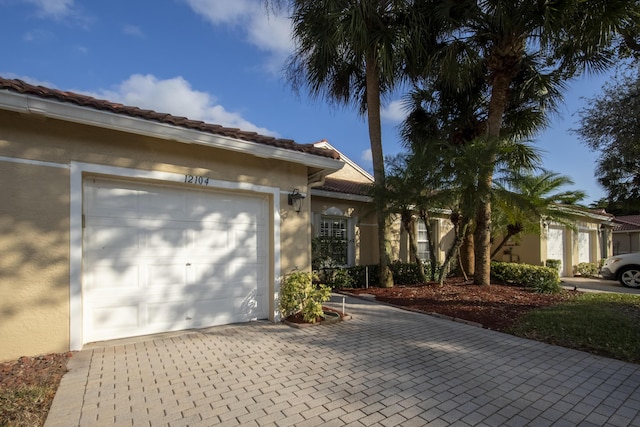 view of front of property with a garage