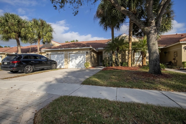 single story home with a garage