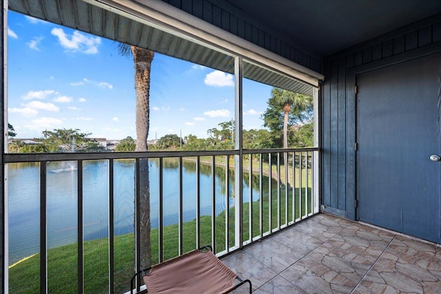 balcony featuring a water view