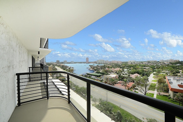 balcony featuring a water view