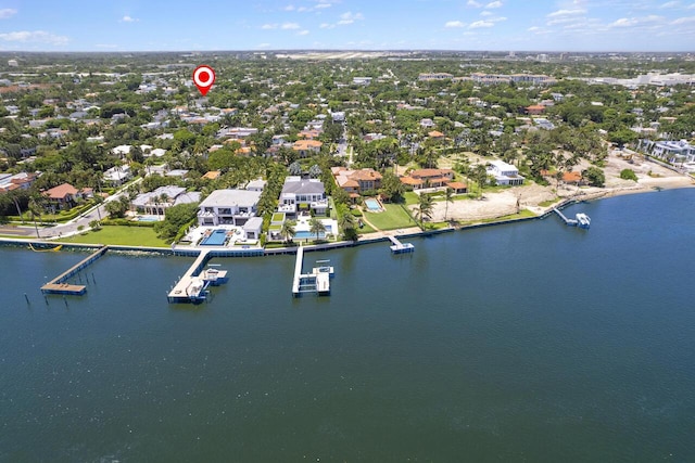 bird's eye view with a water view and a residential view