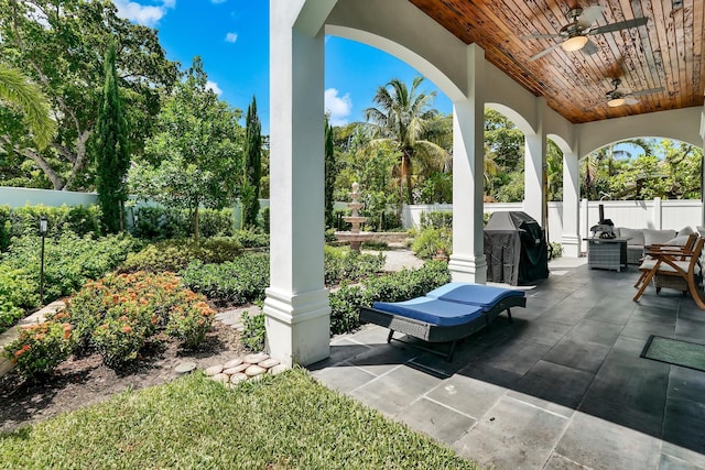 view of patio / terrace featuring ceiling fan, outdoor lounge area, and a fenced backyard