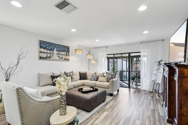 living room with wood-type flooring